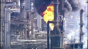 Texas oil refinery explosion close-up fire and smoke at Port Arthur plant